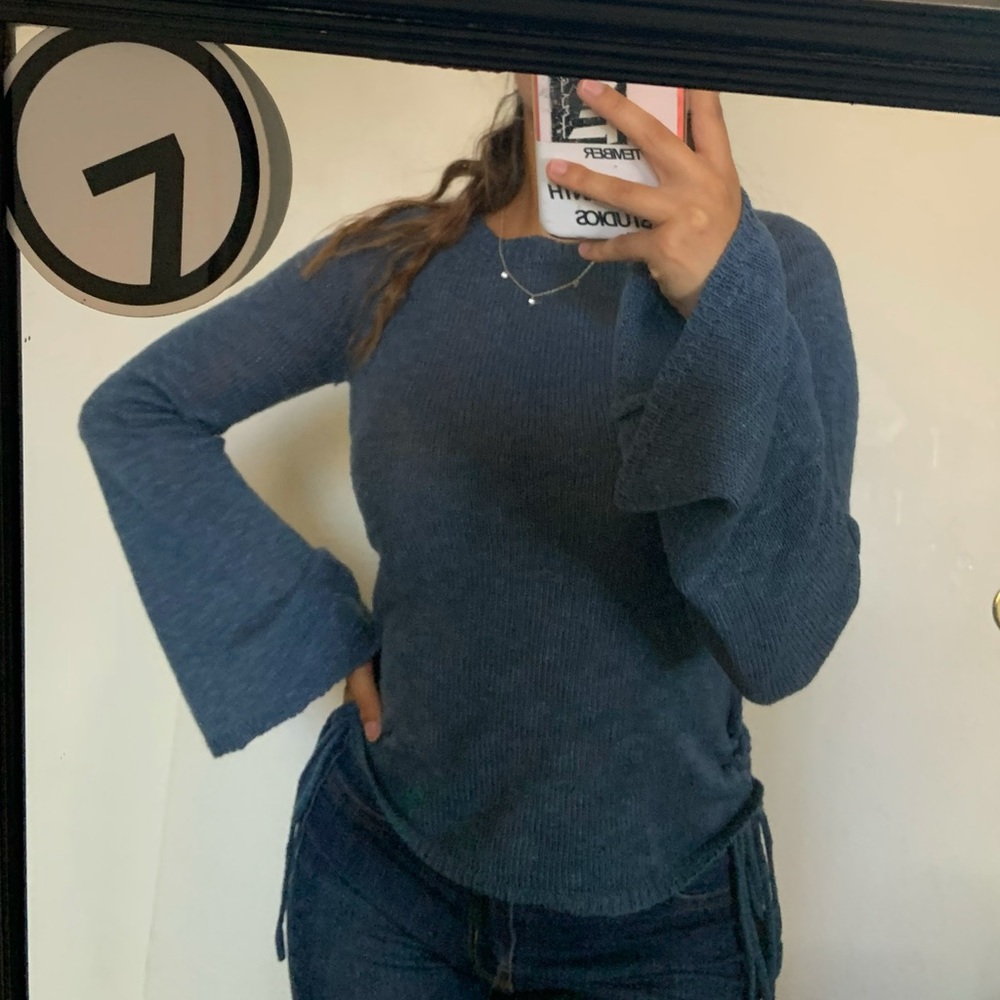 blue long sleeve with ties on the sides